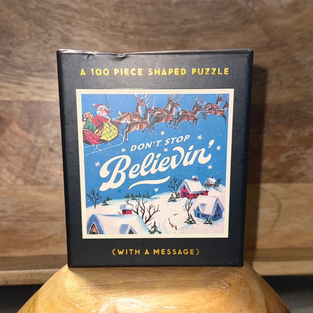 Brass Monkey 100 Piece Shaped‎ Christmas Puzzle Dont Stop Believin Message